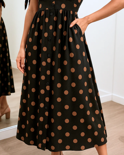 Vestido de lunares con escote en V cruzado®